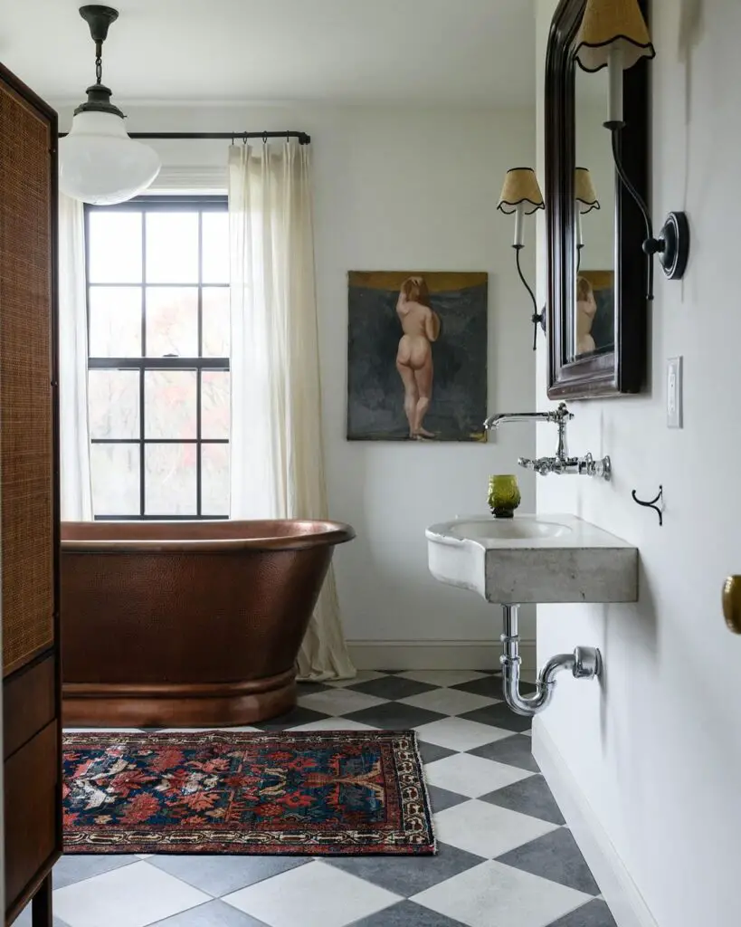 Vintage bathroom with copper tub and art