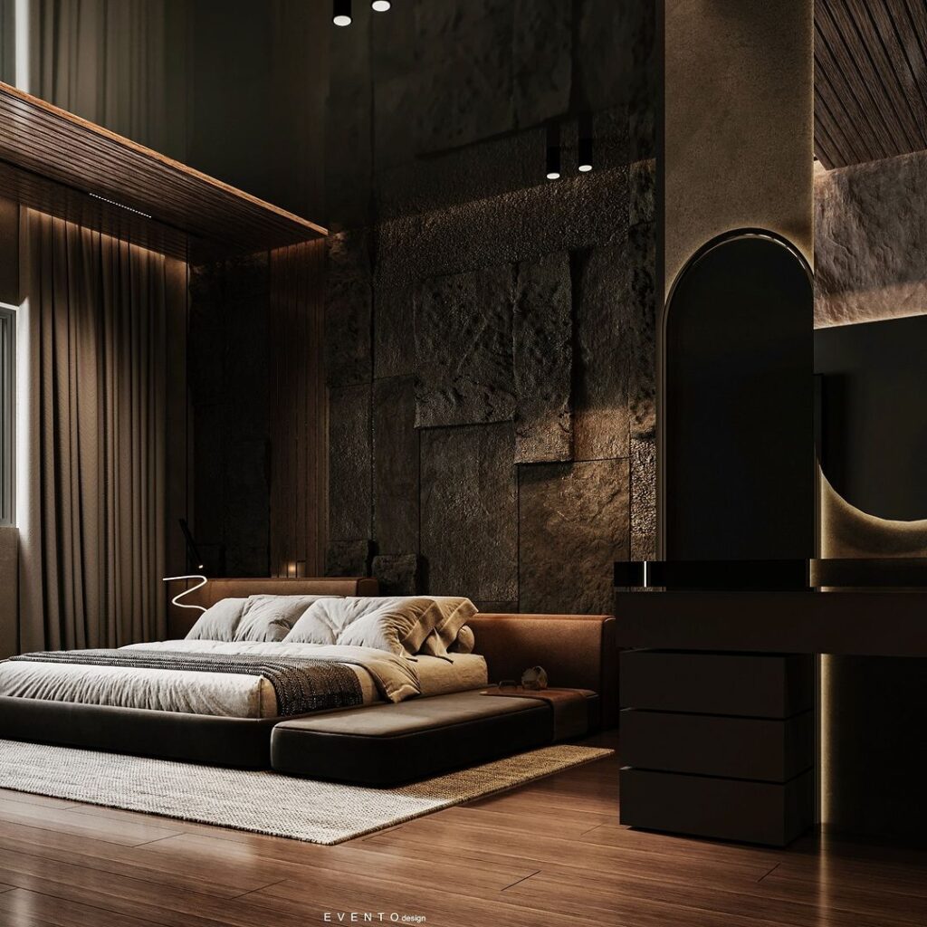 Moody luxury bedroom with stone wall