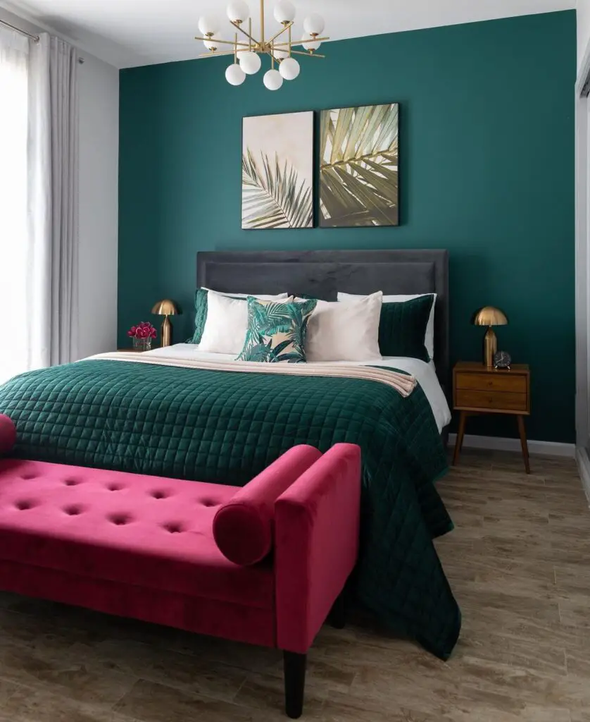 Emerald bedroom with bright pink bench