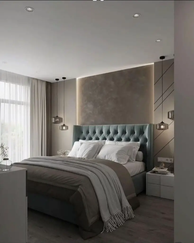 Sleek bedroom with teal tufted headboard