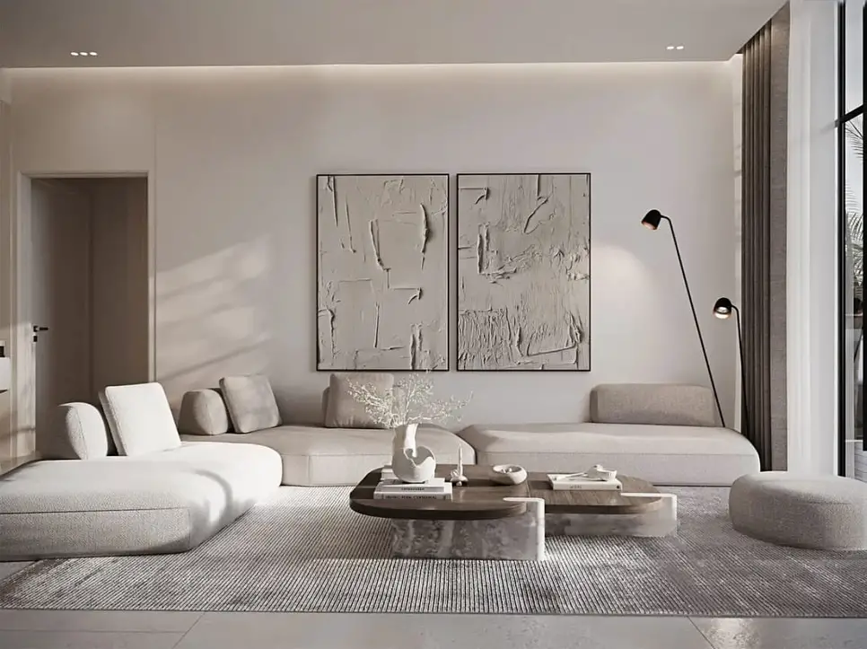 Minimalist living room with gray couch artwork