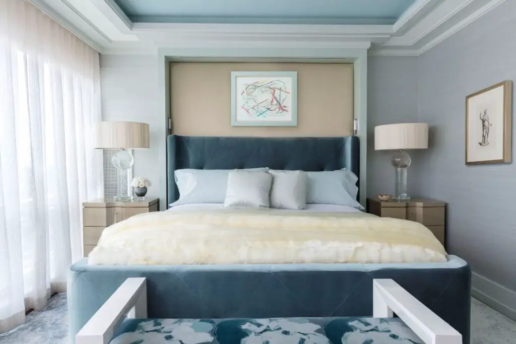 Teal bed with taupe and cream accents