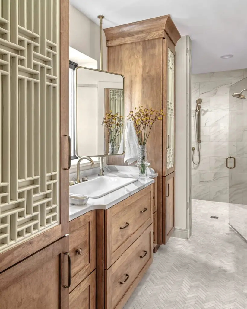 Wooden vanity bathroom with marble shower
