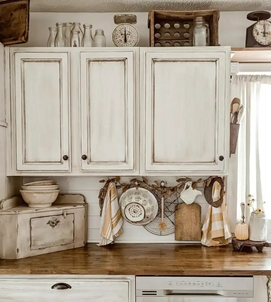 White kitchen cabinets with fall decorations