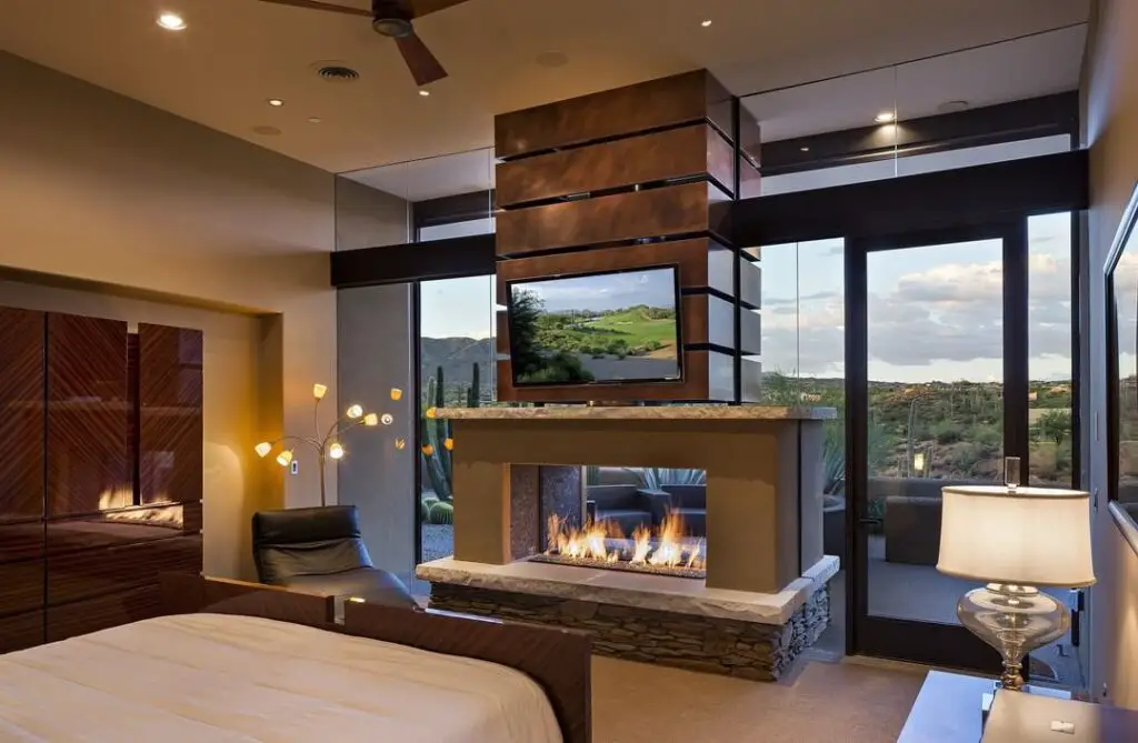 Luxurious bedroom with desert views and central fireplace