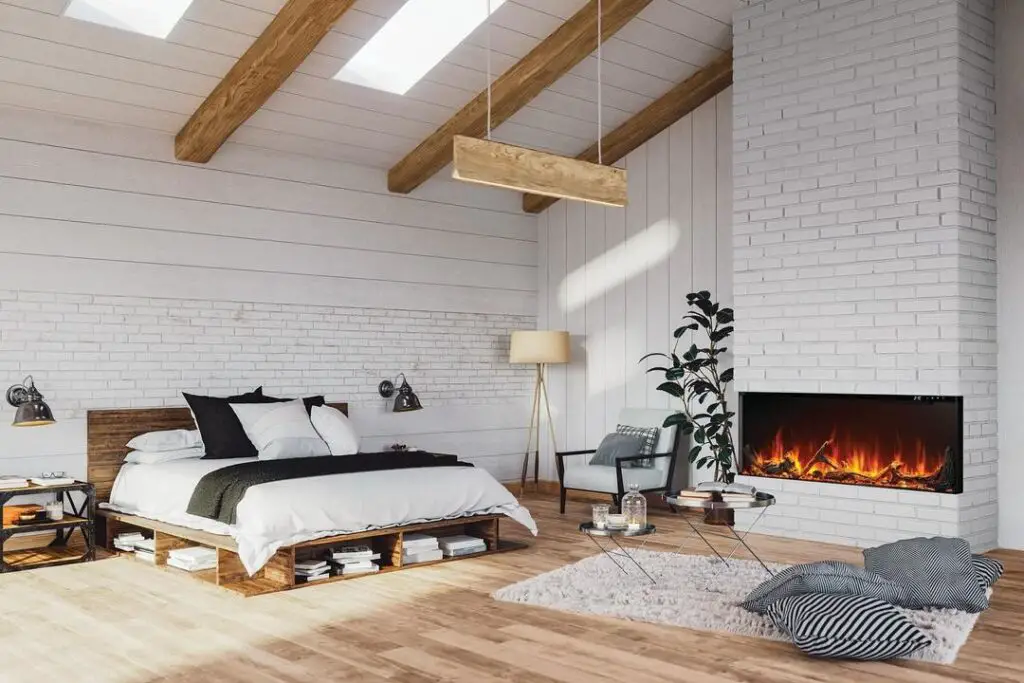 Spacious loft bedroom with wooden accents and electric fireplace